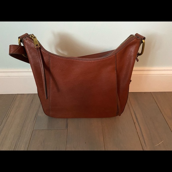 Fossil Handbags - Fossil hobo purse. Leather with side zip pocket.